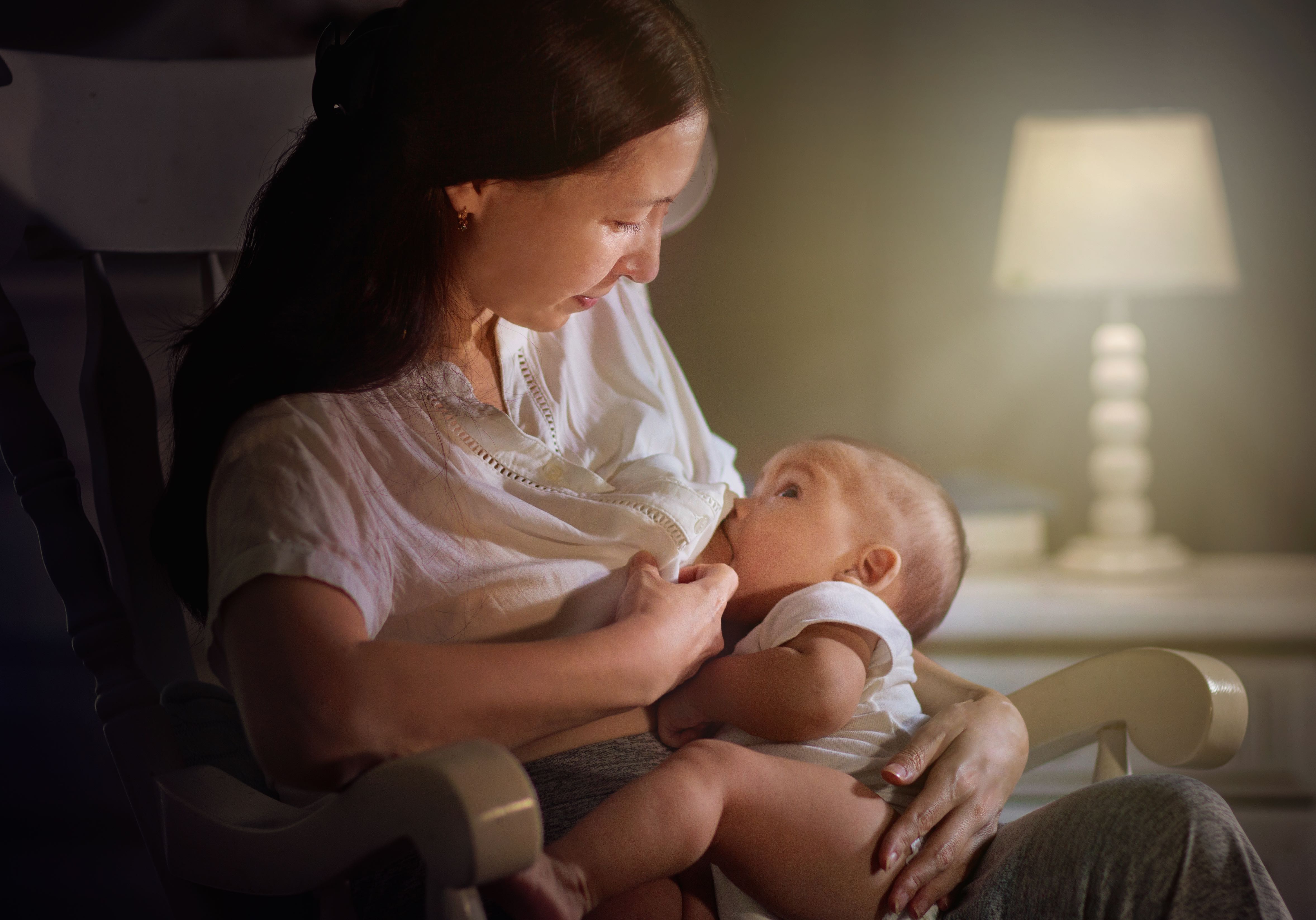 Why Your Baby Started Nursing All Night (And What To Do About It)